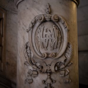 HWH logo on building pillar